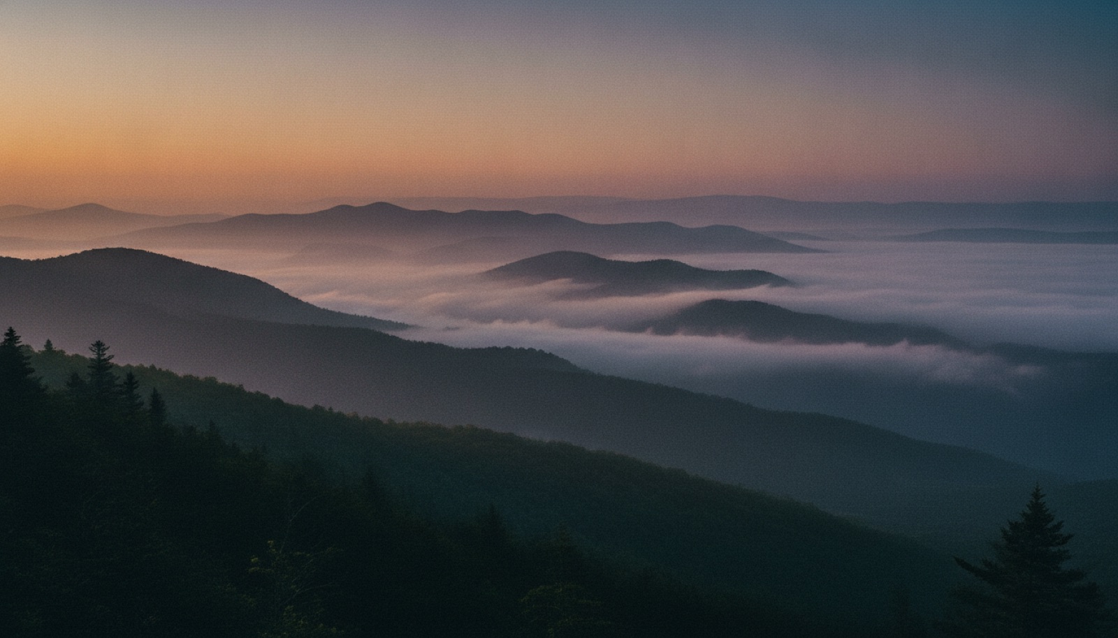 Misty Appalachian mountain ridgelines at dusk